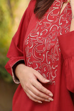 maroon shirt